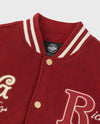 1011266-611 | MEN'S RICH LOGO LOOSE FIT VARSITY JACKET | SUN-DRIED TOMATO