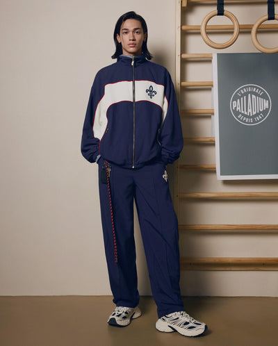 1011877-453 | MEN'S IRIS LOGO SIDE STRIPES LOOSE FIT PANTS | MARITIME BLUE