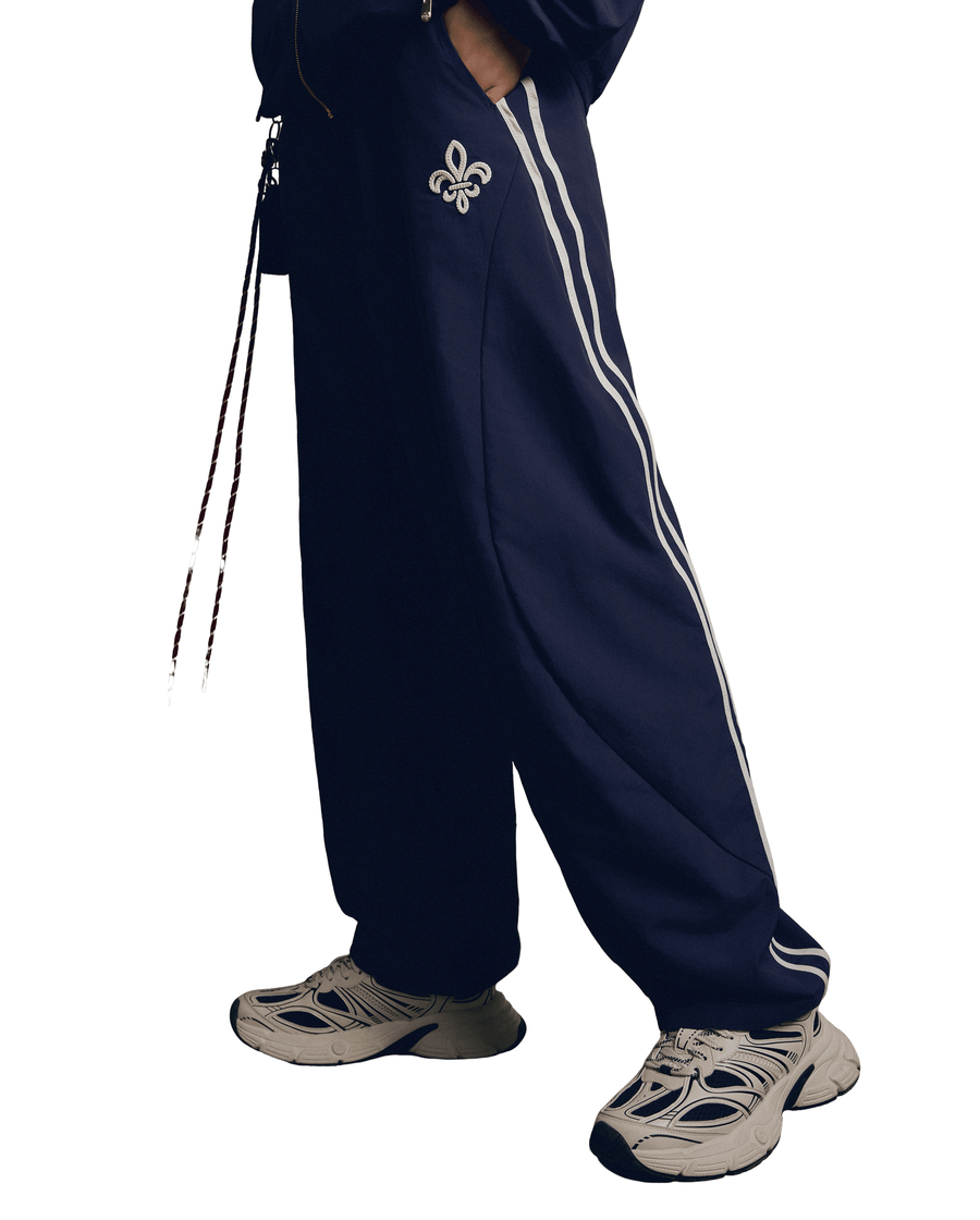 1011877-453 | MEN'S IRIS LOGO SIDE STRIPES LOOSE FIT PANTS | MARITIME BLUE