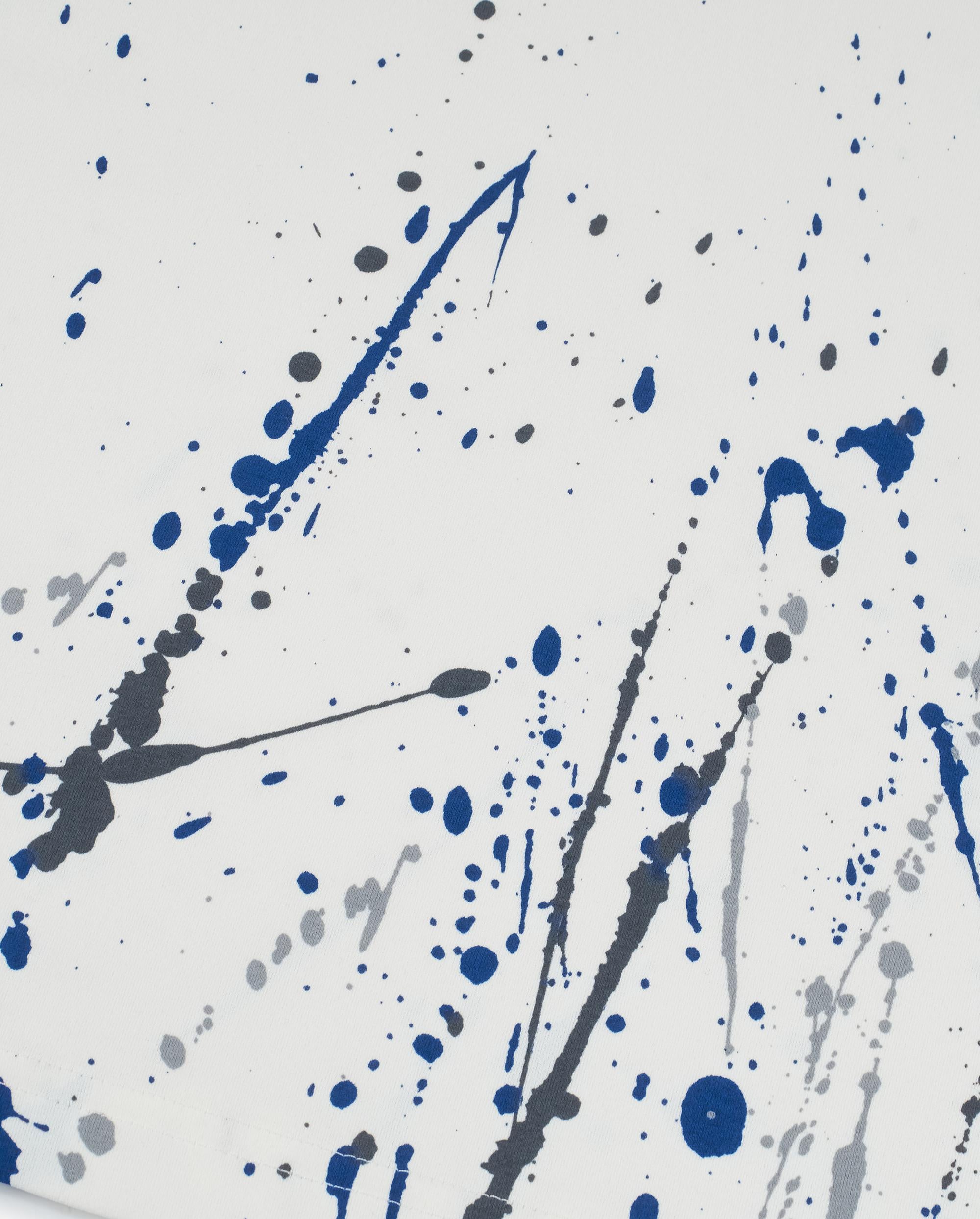 1012659-262 | MEN'S LOGO LOOSE FIT PAINT SPLATTER T-SHIRT | MARSHMALLOW