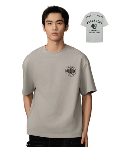 109644-031 | MEN'S HERITAGE PALLADIUM LOGO LOOSE FIT COTTON T-S | FLINT GRAY