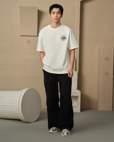 109644-232 | MEN'S HERITAGE PALLADIUM LOGO LOOSE FIT COTTON T-S | VANILLA ICE