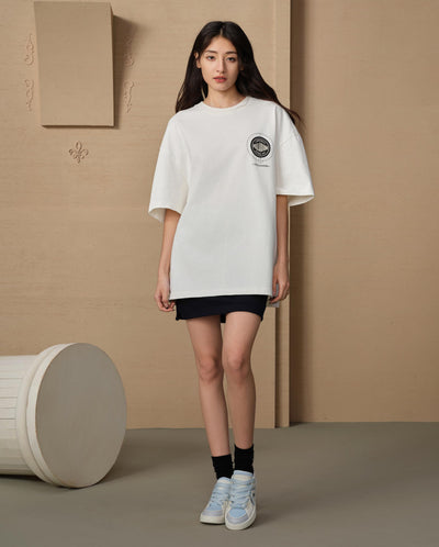 109649-262 | MEN'S PALLADIUM LOGO LOOSE FIT COTTON T-SHIRT | MARSHMALLOW