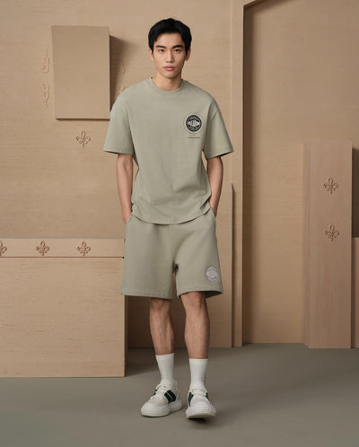 109689-354 | MEN'S VINTAGE PALLADIUM LOGO LOOSE FIT SHORTS | SEAGRASS